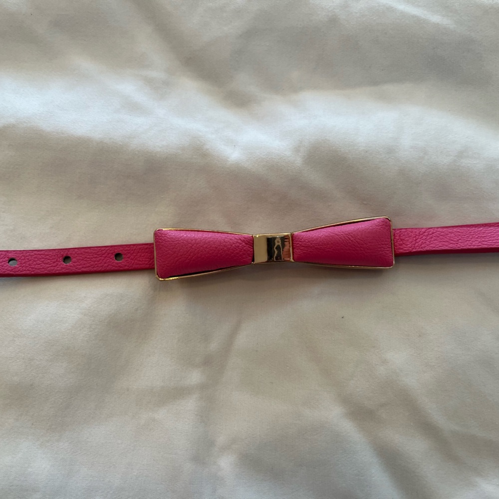 Betty Page Tatiana pink, and gold bow belt